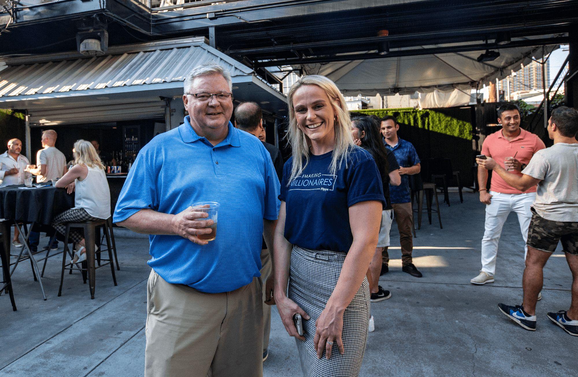 Flippa Staff Member smiling with guest